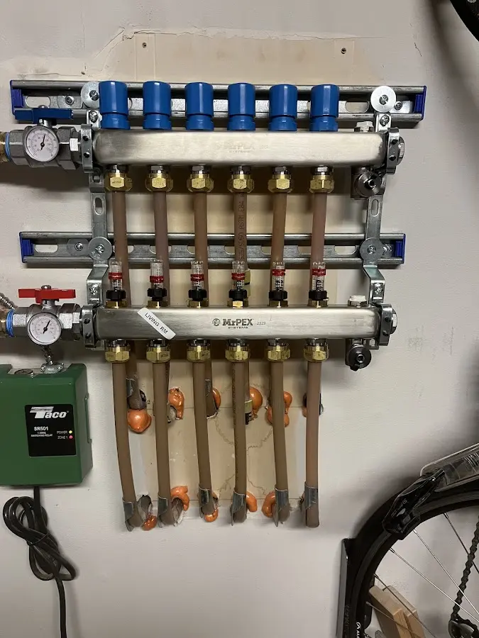 Plumber performing Gas Line Installation at a residential property in Lewistown